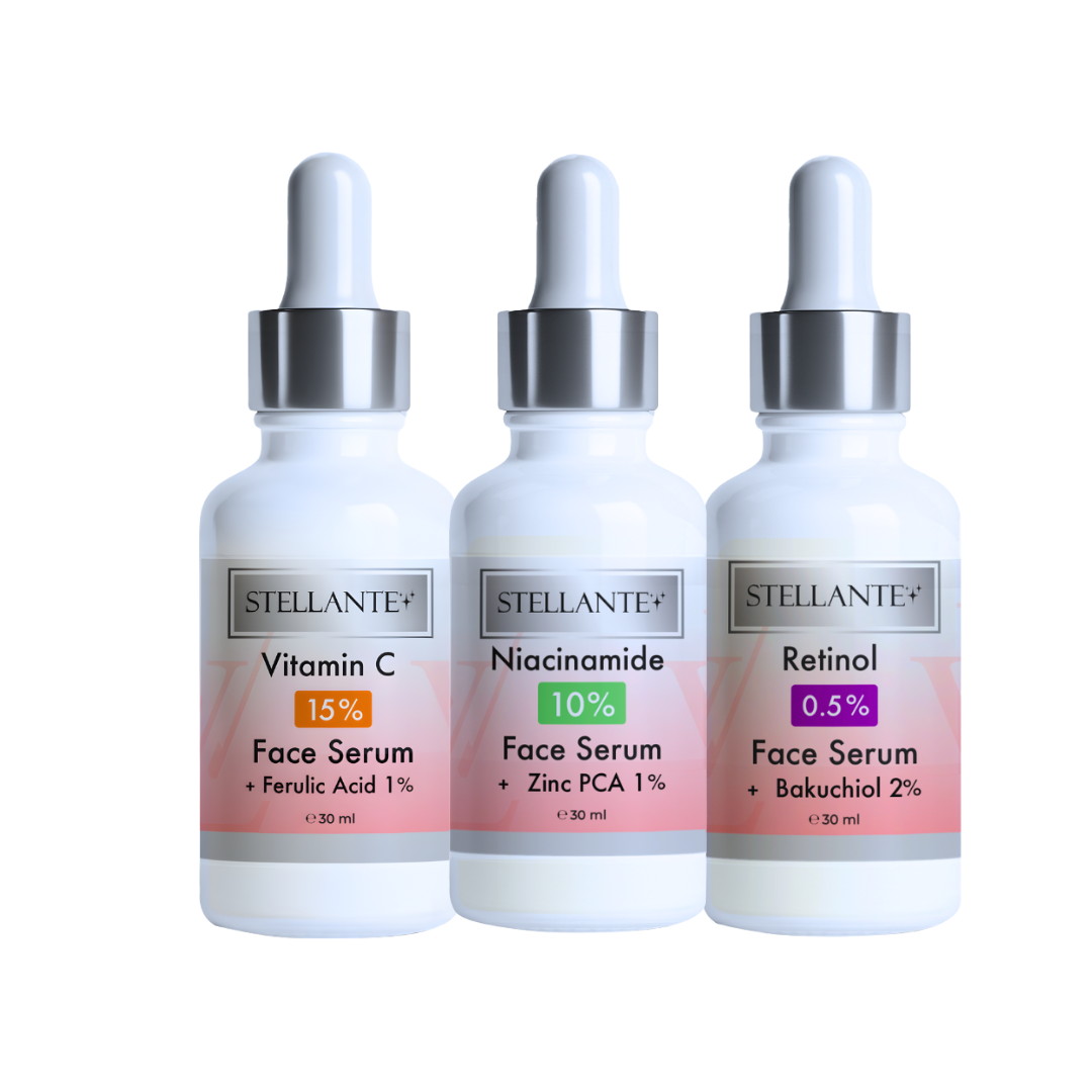 Three Stellante face serum bottles with droppers on a white background