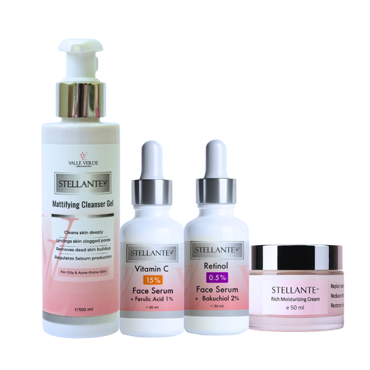 Set of Stellante skincare products including cleanser, serums, and cream on a white background